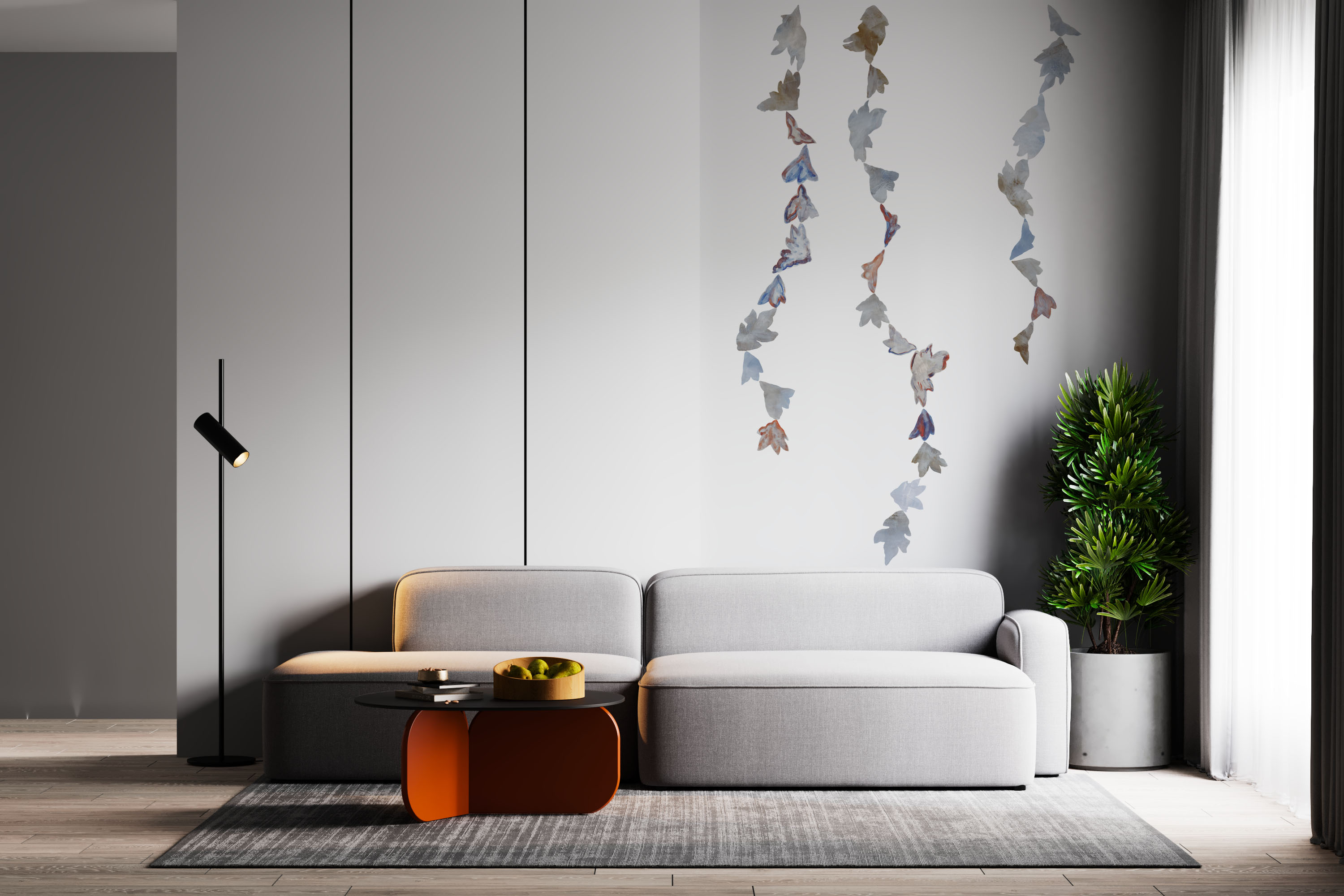 Vægdekoration i stue med blå blade af selvklæbende tapet