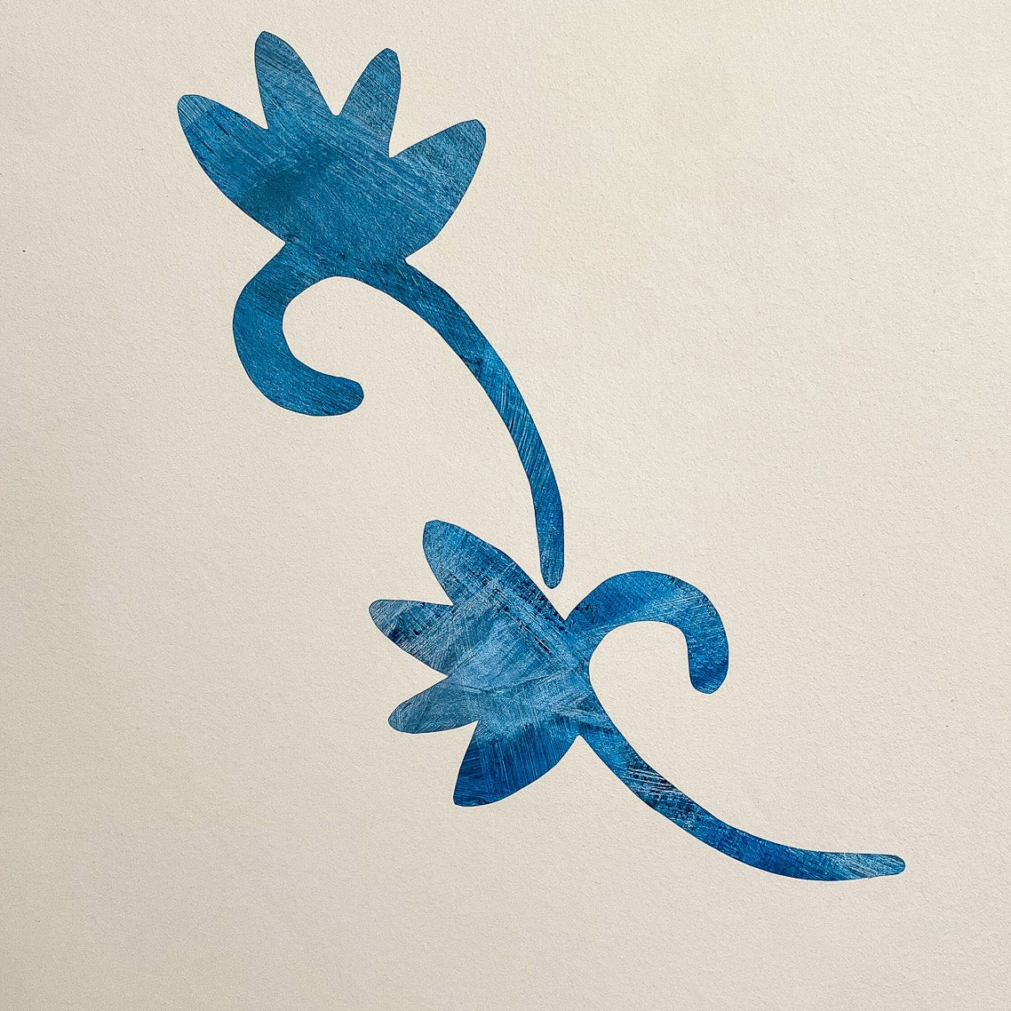 blue wallpaper border with flower swirl