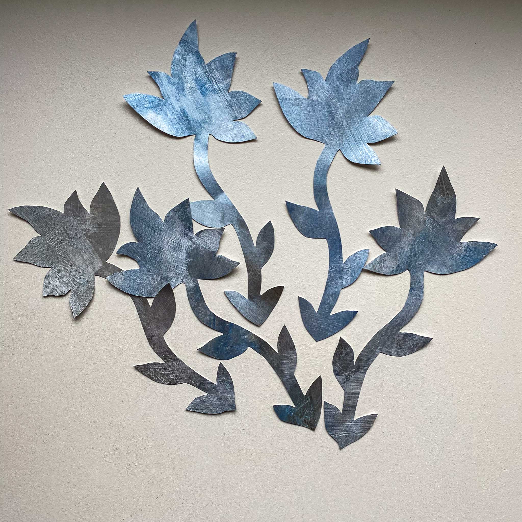 sæt med blå blomster vægdekorationer