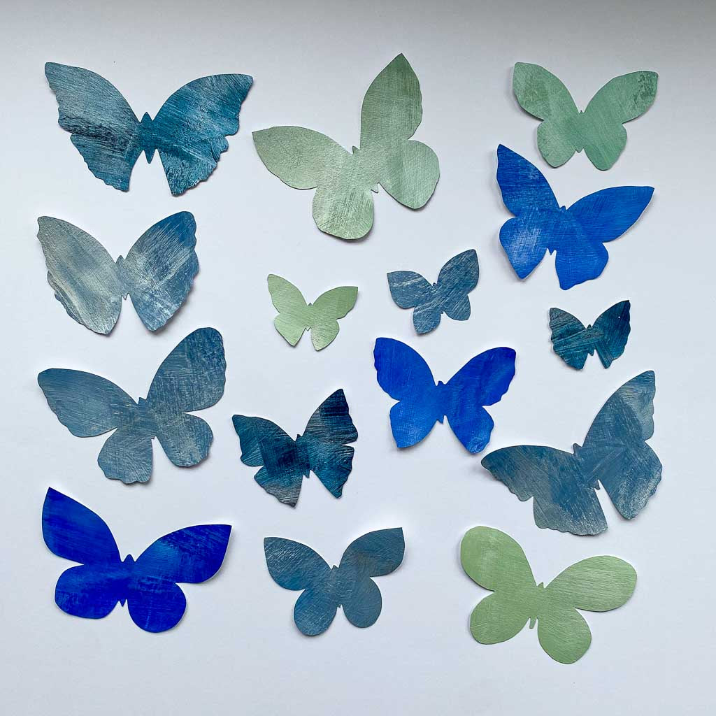 blå, grønne og mørkeblå sommerfugle wall stickers i forskellige størrelser, håndmalet.