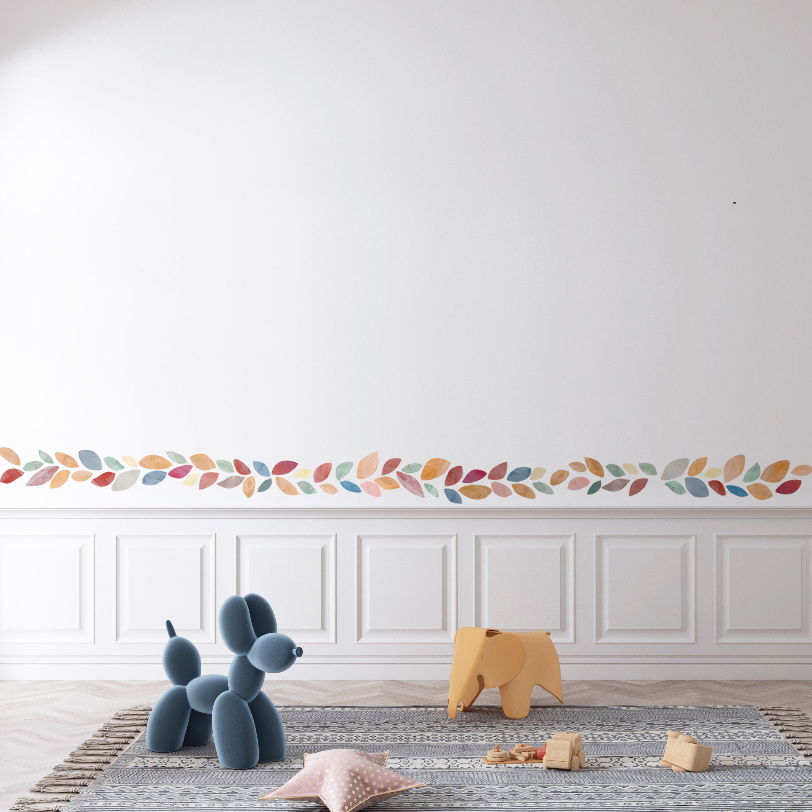 selvklæbende tapetbort i børneværelse. Farverige håndmalede blad wall stickers.