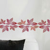 red wallpaper border with leaves